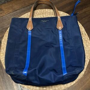 $50 Tory Burch Perry nylon tote bag in navy blue with tan leather handles